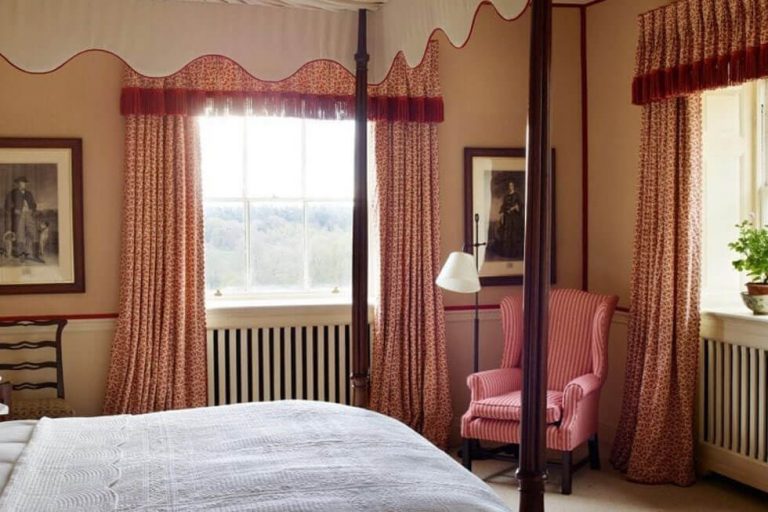 Photo of the Red Four Poster bedroom at Farleigh Wallop