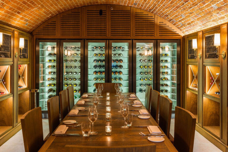 Photo of a dinner in the wine cellar at The Langley